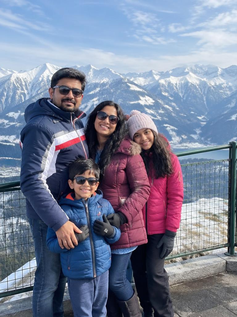 Family at a snowy viewpoint
